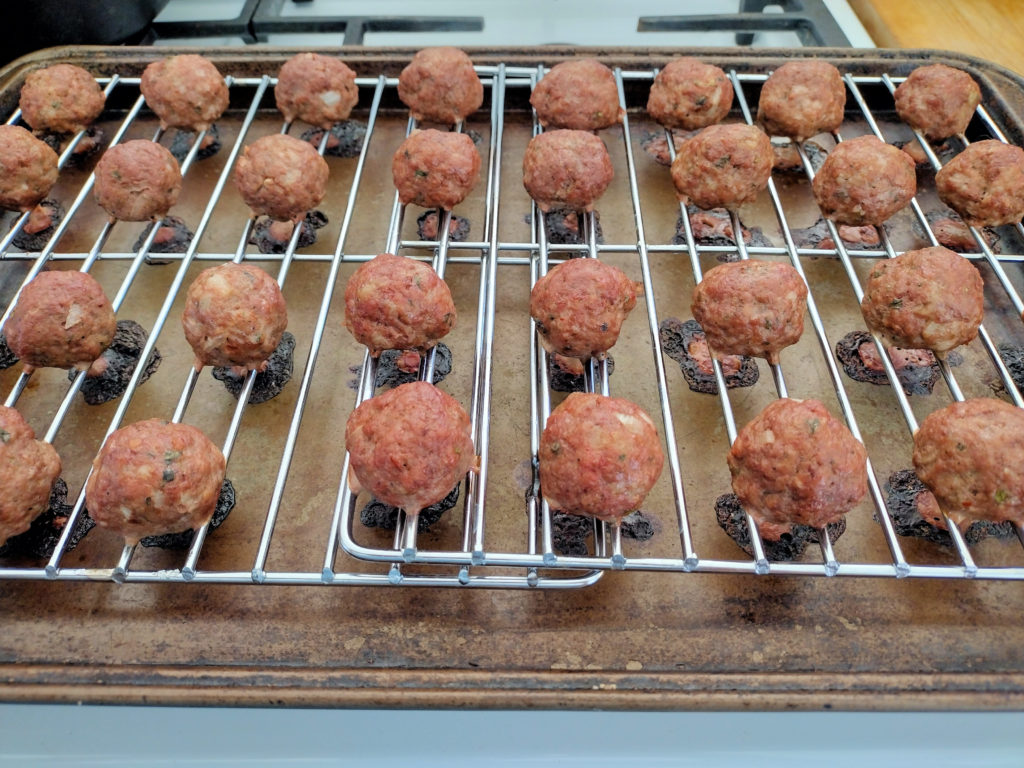 Cooked Meatballs: All the fat and burnt bits are down in the pan! 
